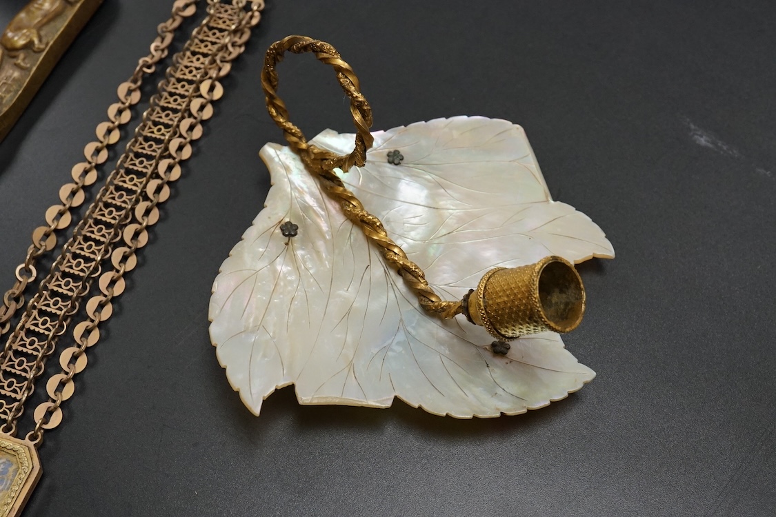 19th century objects to include a bronze lion paperweight, a Palais Royale chamberstick, a beadwork pocket, chatelaine etc